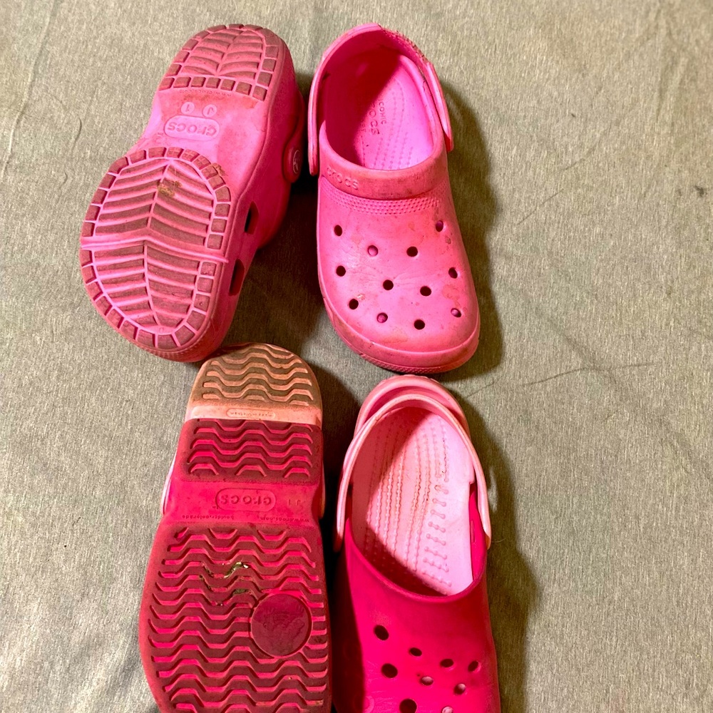 2 pairS of Pink crocs